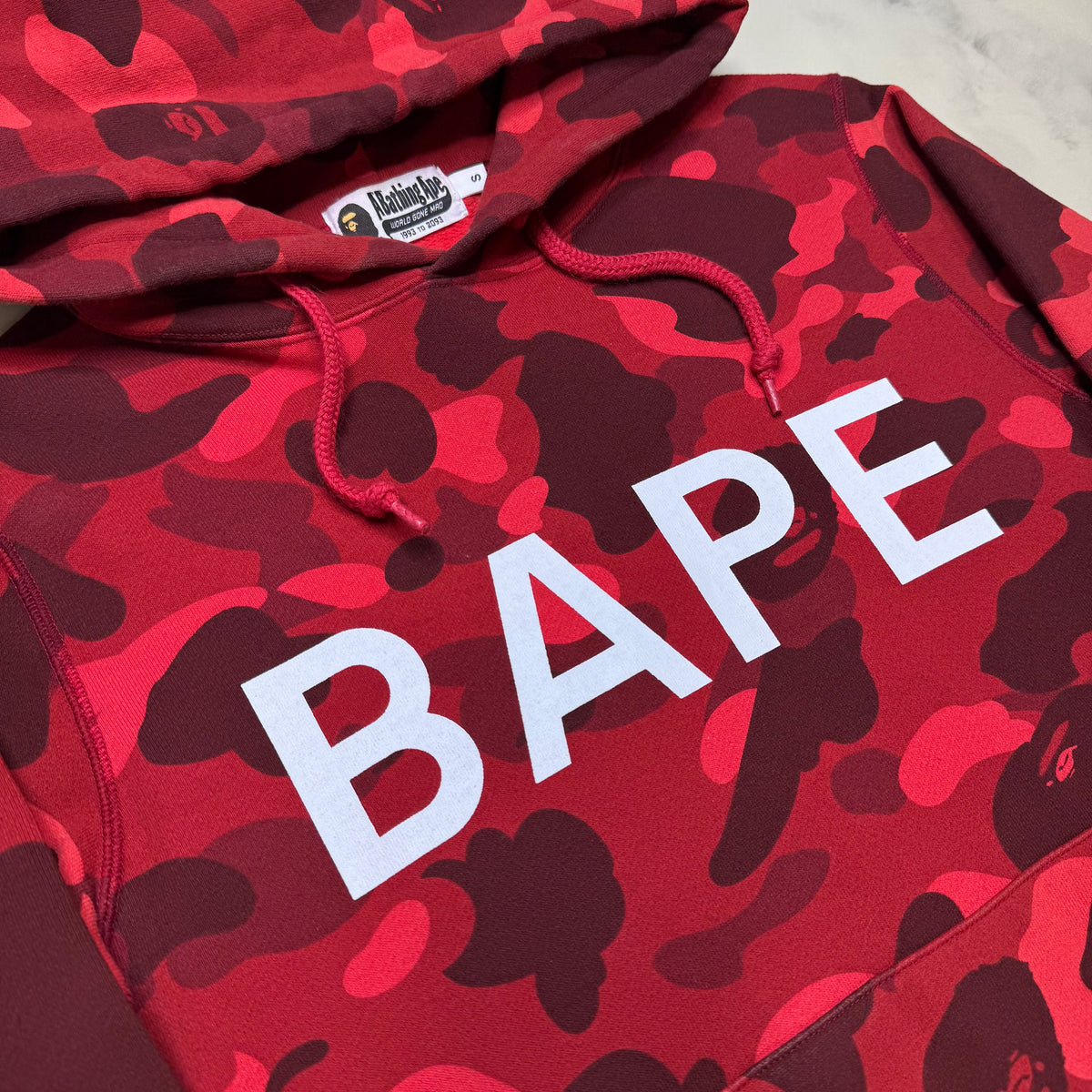 [S] Bape Red 1st Camo Spell Out Hoodie